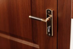 modern style door handle on natural wooden door 1 2