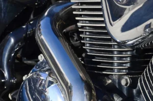 close up fragment of chromed shiny body part of old classic motorbike 2