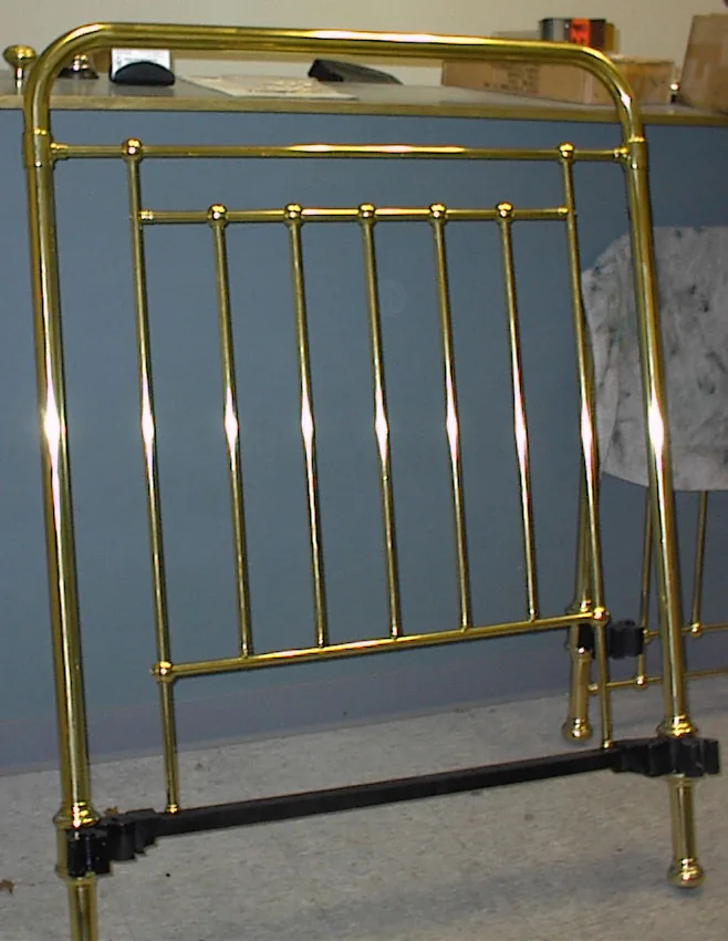 restored brass bed after